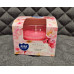 Aromatic candle with the scent of pink flowers
