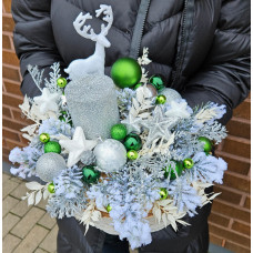 Christmas candle in silver tones with a deer
