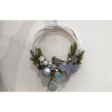 Door wreath with a bird