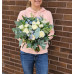 Bridal bouquet with roses and delphinium